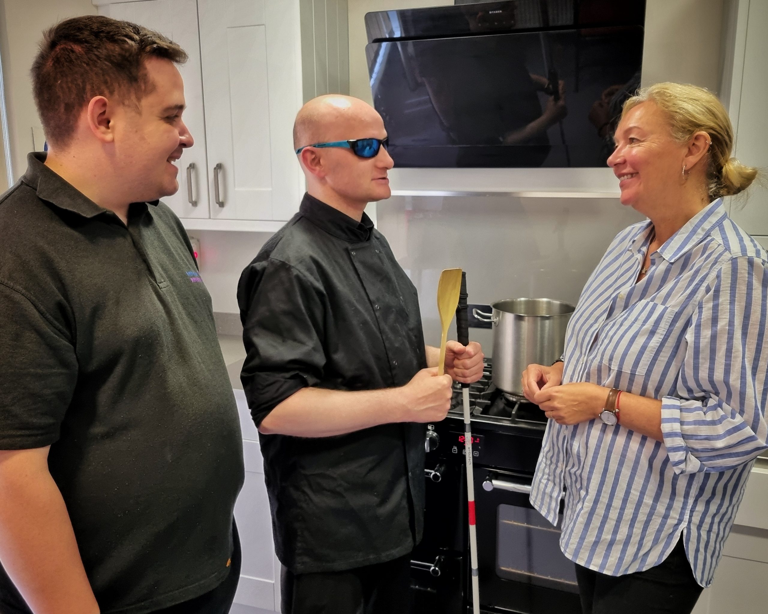 Left to right: Tom Hutchens, FVSC general assistant, chef David Black and chief executive Jacquie Winning having a conversation in the kitchen of the FVSC café.