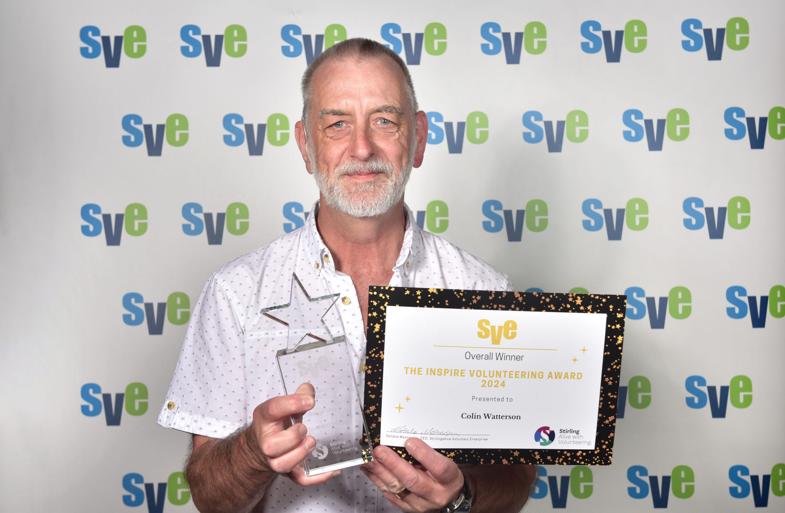 Colin with his award.