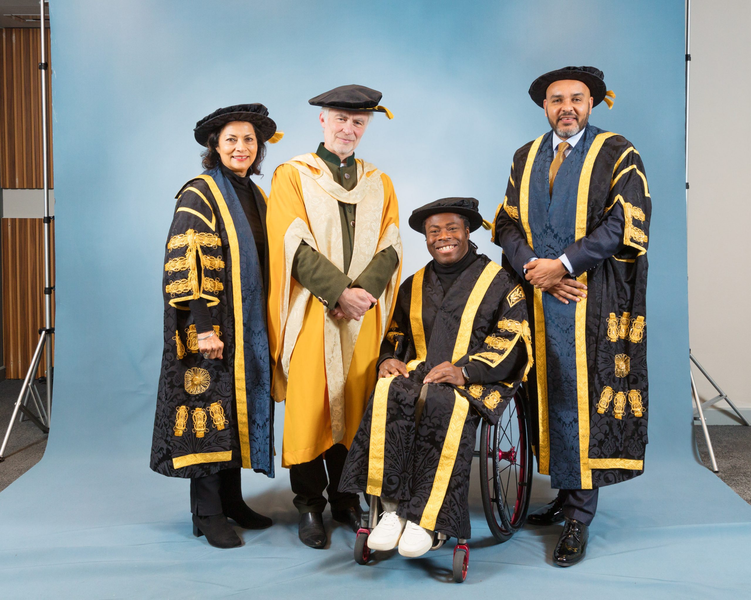 BCU Winter Graduations. From left to right: BCU Chair of Governors Anita Bhalla OBE, Simon Labbett, BCU Chancellor Ade Adepitan, and BCU Vice-Chancellor Professor David Mba. (Credit BCU / Junction 10 Photography).