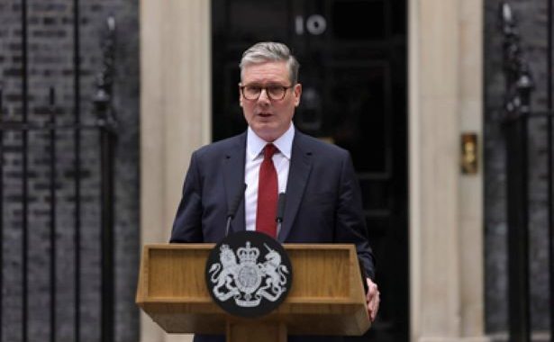 Prime Minister Keir Starmer standing behind a podium in front of 10 Downing Street.